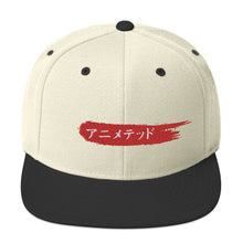 Load image into Gallery viewer, Natural and Black snapback hat with Animeted Brand's red paintbrush logo written in Japanese Katakana.
