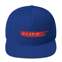 Load image into Gallery viewer, Royal Blue snapback hat with Animeted Brand's red paintbrush logo written in Japanese Katakana.